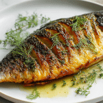 Pyszny grillowany karp air fryer na talerzu